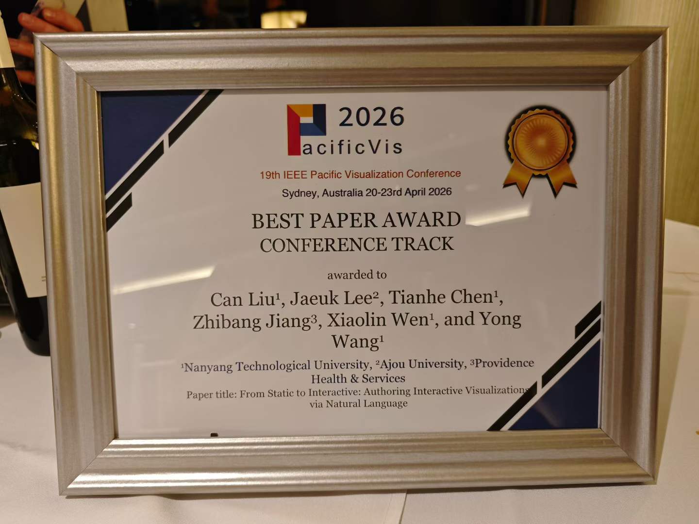 A framed IEEE PacificVis 2026 Conference Track Best Paper Award certificate.